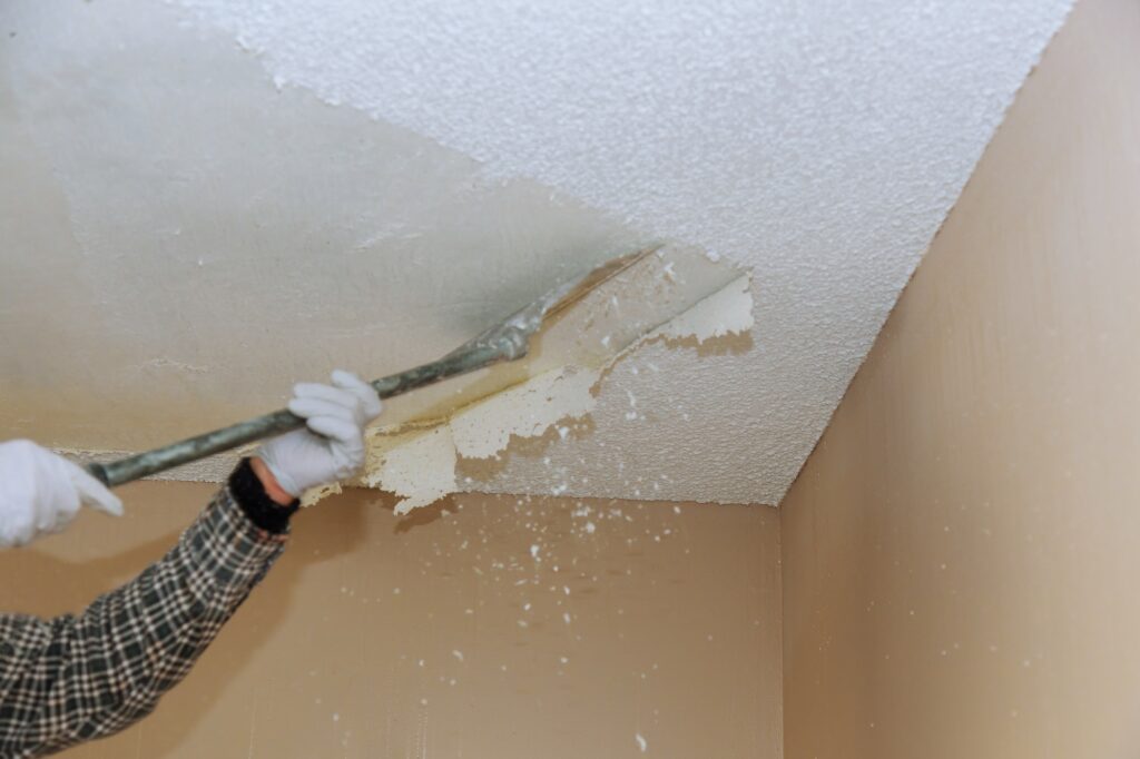 Home ceiling drywall demolition popcorn ceiling texture unfinished renovated